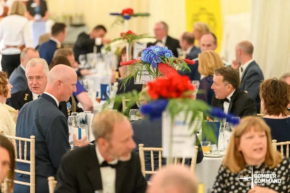 A colour image of a formal dinner