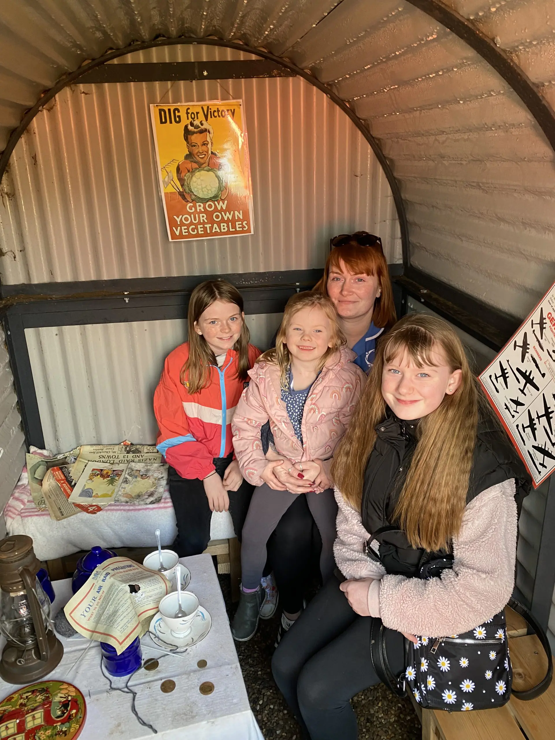 Cox family in the Anderson Shelter