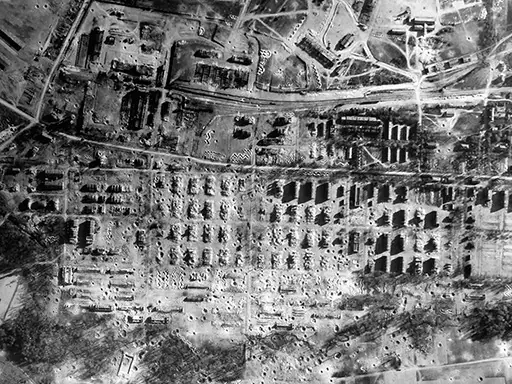 Black and white aerial photograph of a bombed Mailly-le-Camp taken in 1944