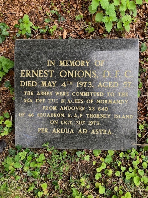 Colour photo of the stone honouring Ernest Onions.