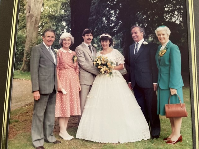 Pearce & Box wedding: colour picture of couple with parents