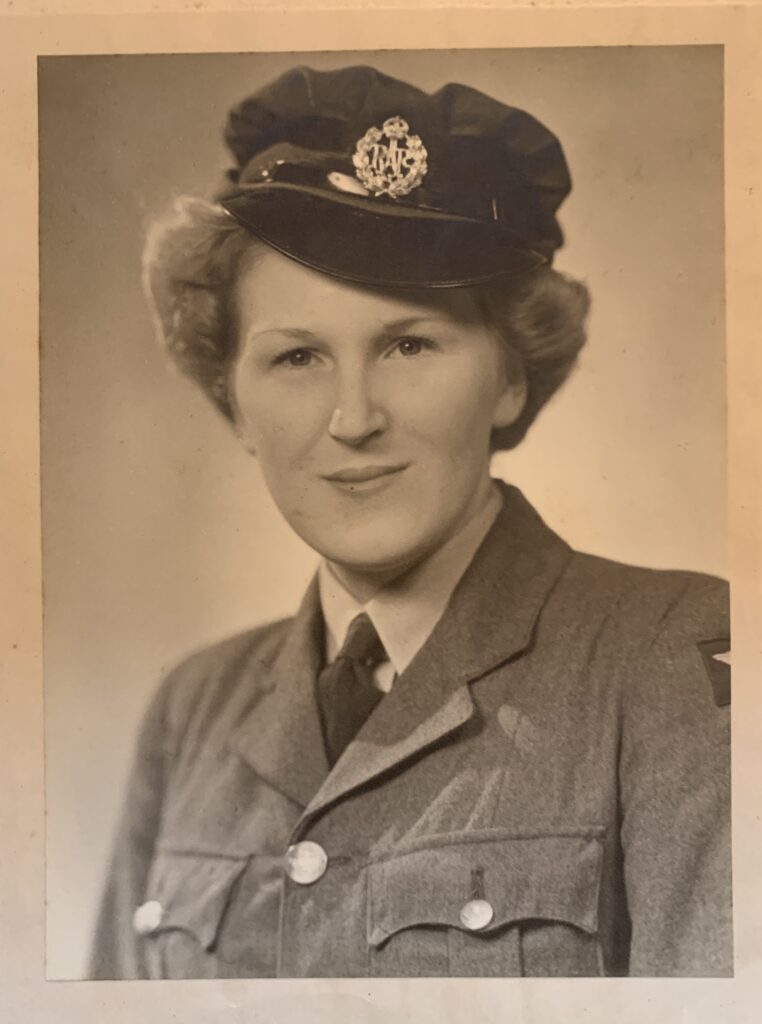 Sepia photo of a young lady in WRAF uniform