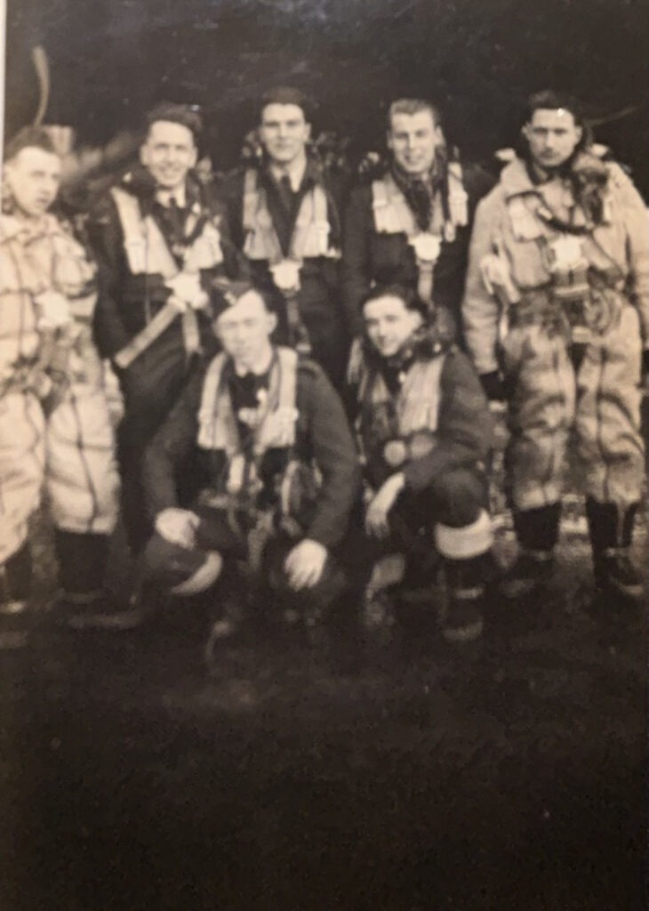 Black and white image of a bomber crew from ww2