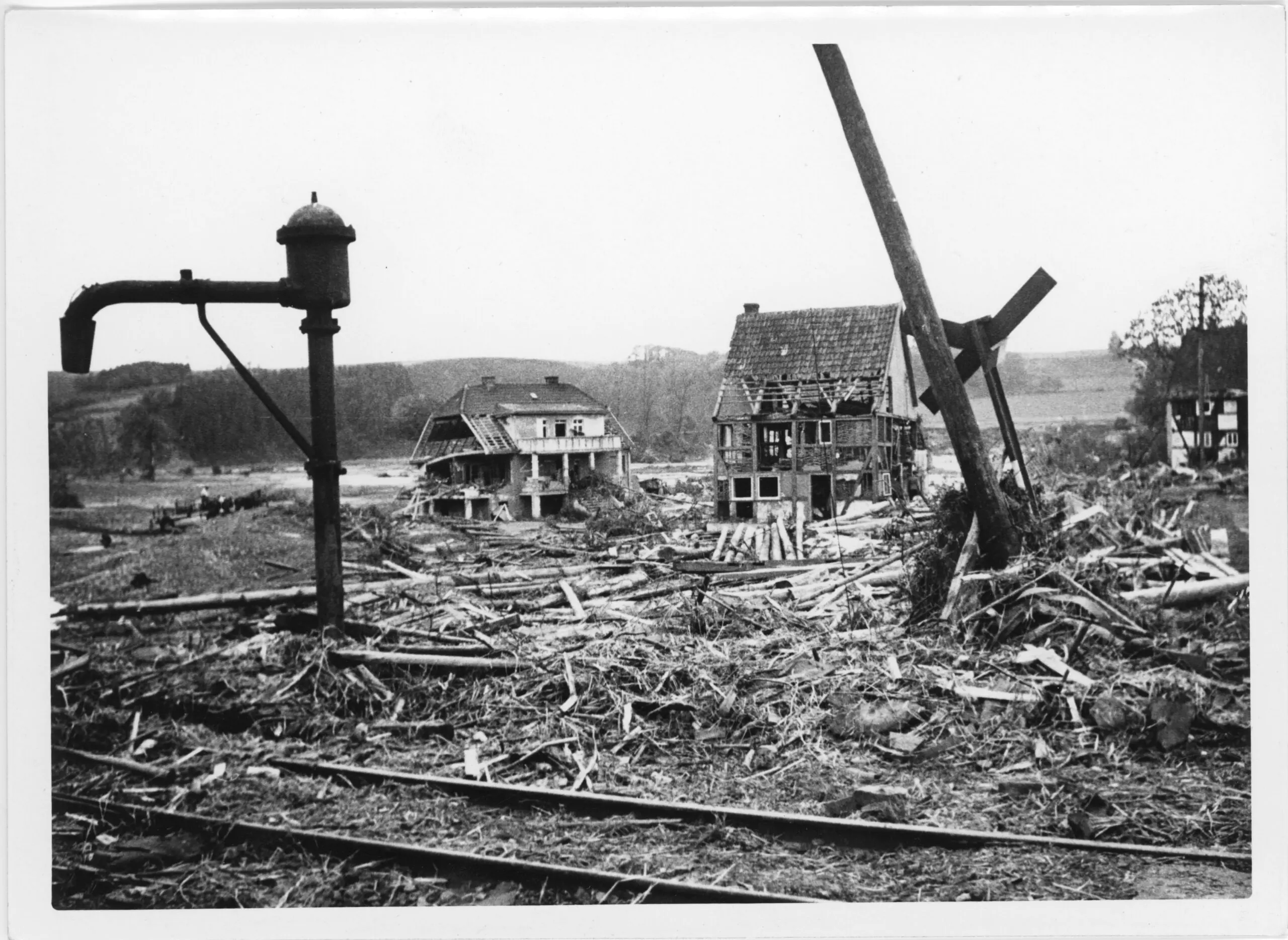 Black and white photo of damage after the flood from the Mohne Dam