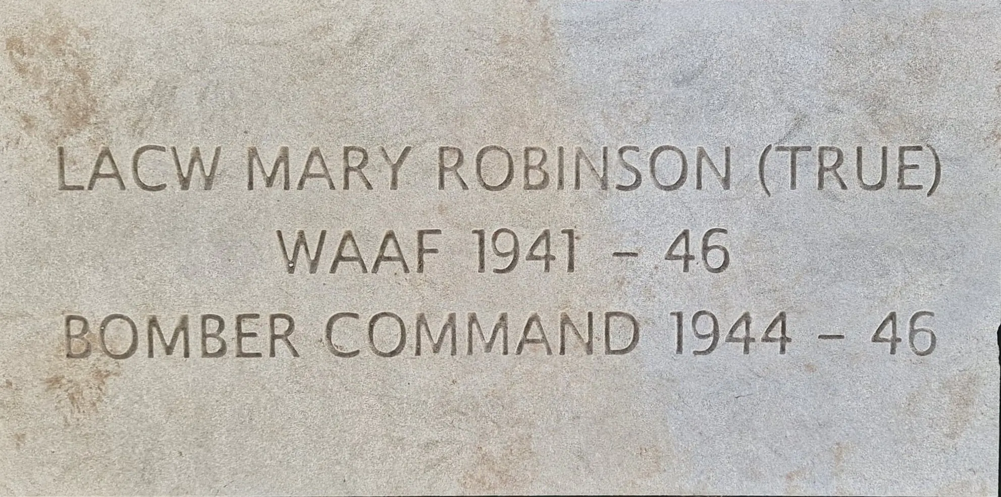 Colour image of a stone of remembrance for Mary Robinson
